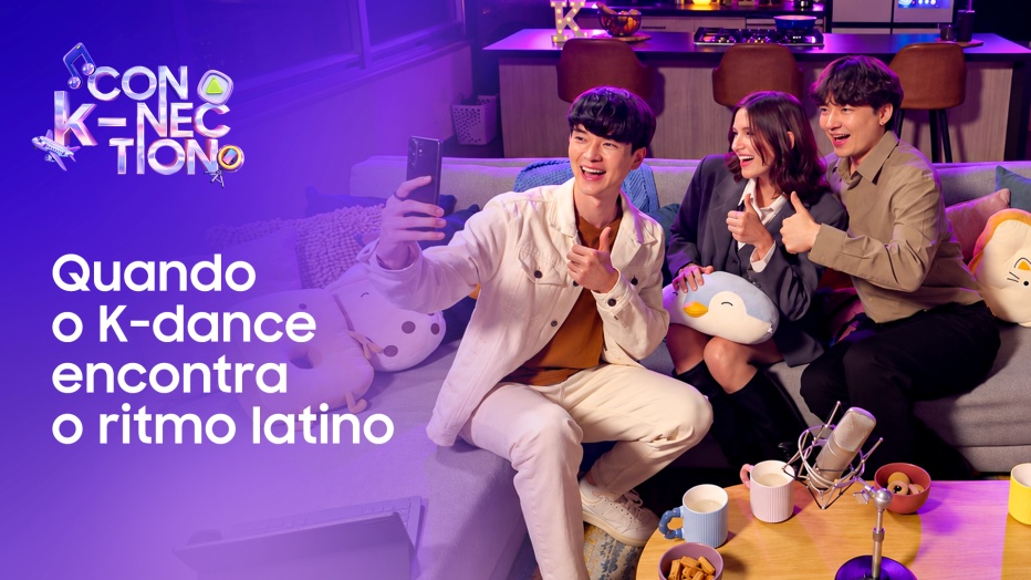 Imagem de divulgação do terceiro episódio da série K-Connection, da Samsung. Na foto, três influenciadores aparecem sorrindo para um celular Samsung Galaxy. Também aparece a frase "Quando o K-dance encontra o ritmo latino".