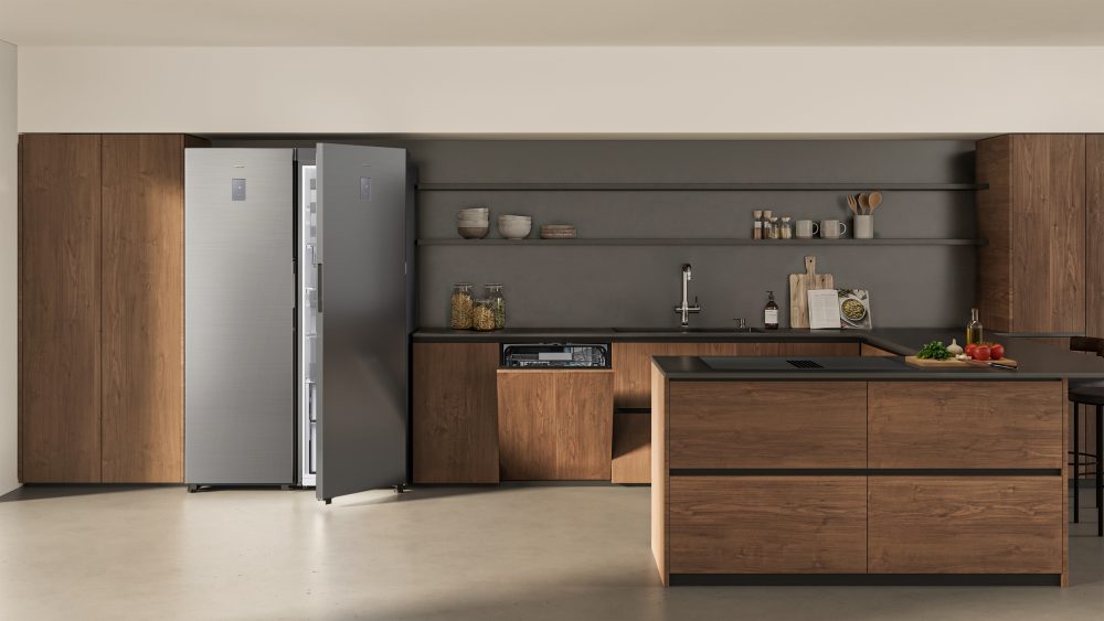 Samsung refrigerator and dishwasher integrated into a modern wood kitchen, showcasing a coordinated premium appliance design.