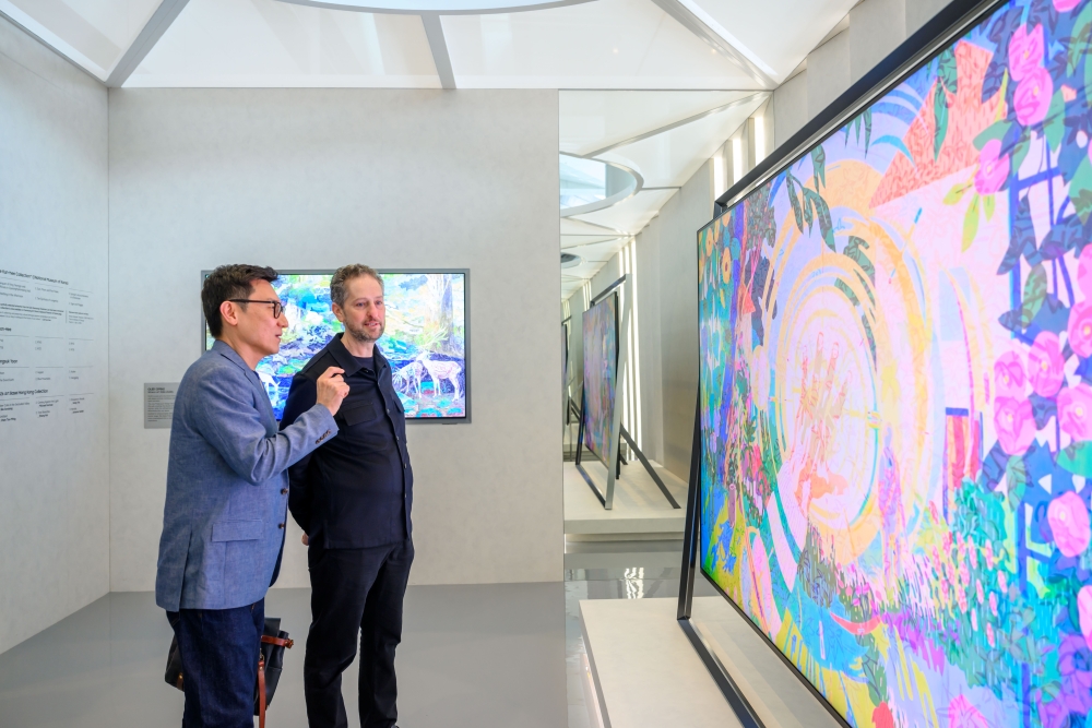 Junwha Hong, Vice President and Head of Marketing for Samsung’s Visual Display Business and Art Basel CEO Noah Horowitz at Samsung Art Lounge