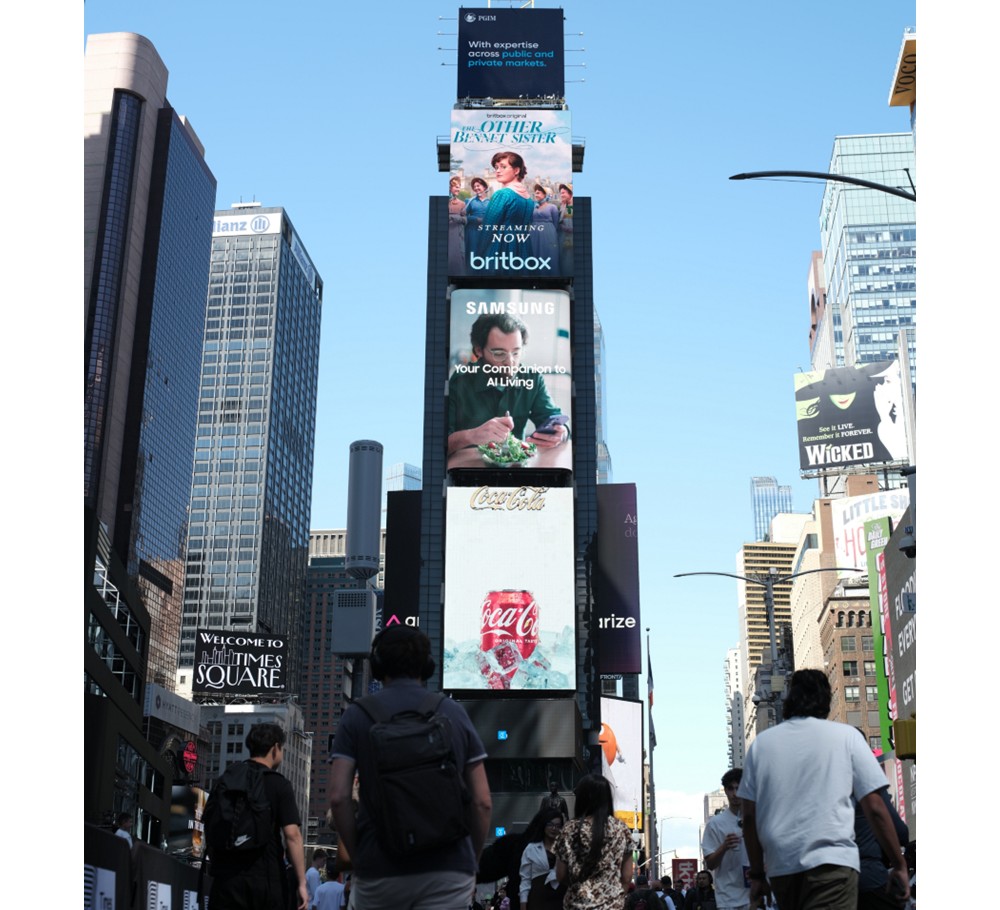 The video is shown on a screen in New York's Time Square.