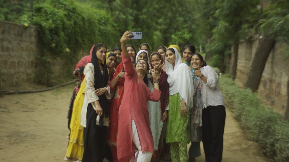 Participants gather for a photo following one of Baala's community workshops in northern India.