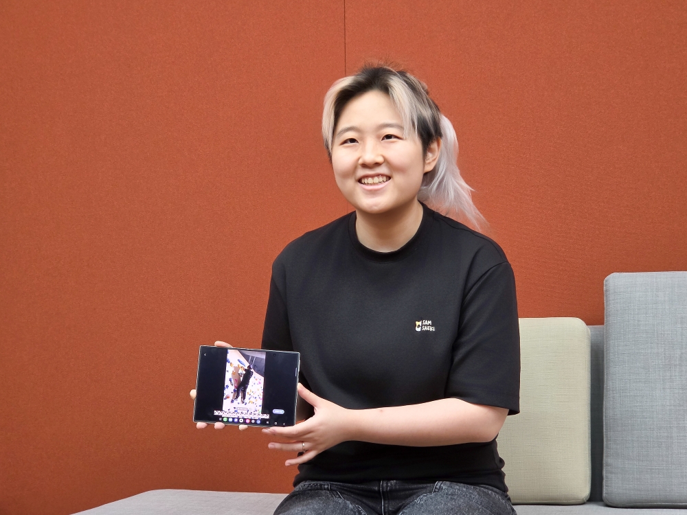 Hong shows a personal video used for testing.