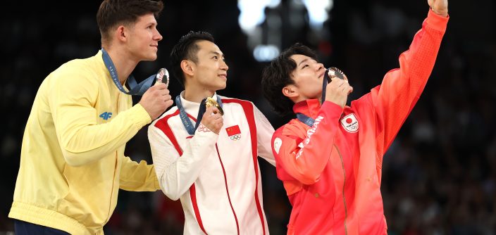 Artistic-Gymnastics-Men’s-Parallel-Bars-victory-selfie.jpg